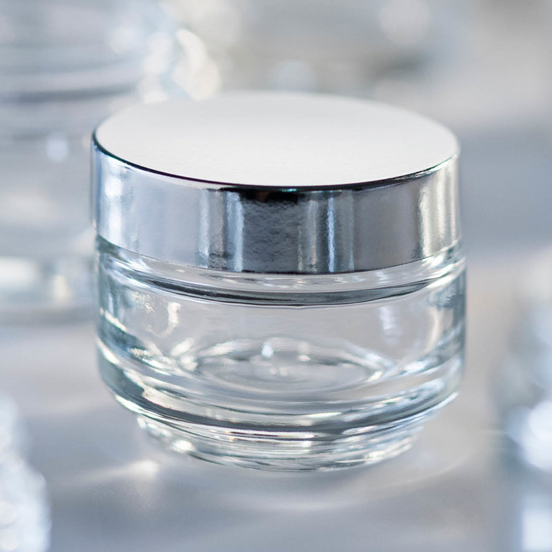 Cosmetic glass jar with closure