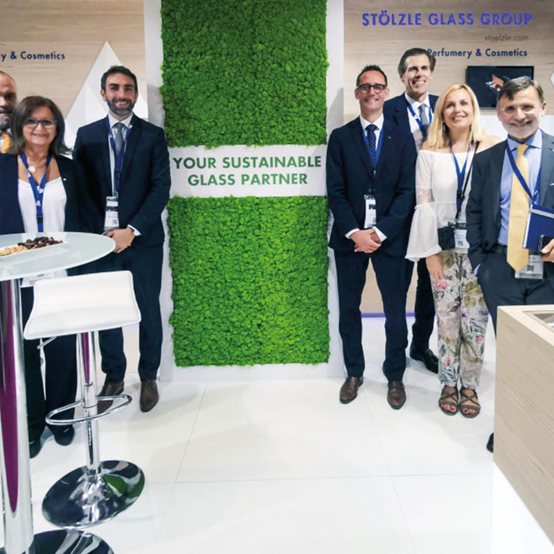 People at the exhibition booth at Luxe Pack Monaco in 2019