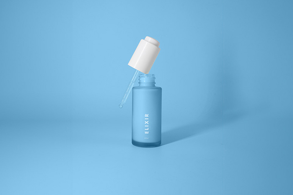 Elixir bottle on a blue background