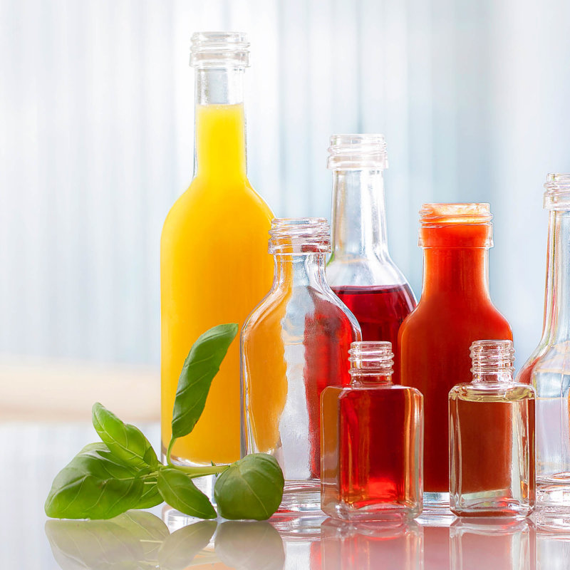 Sauces and juice stored in glass bottles