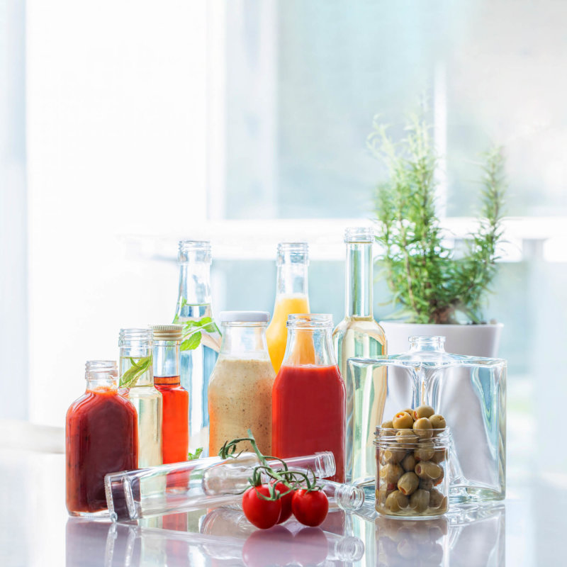 Selection of filled bottles on a table