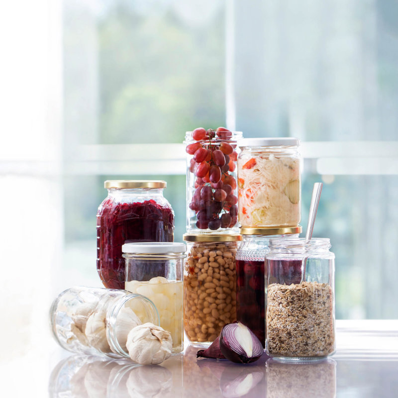 Selection of filled glass jars on a table