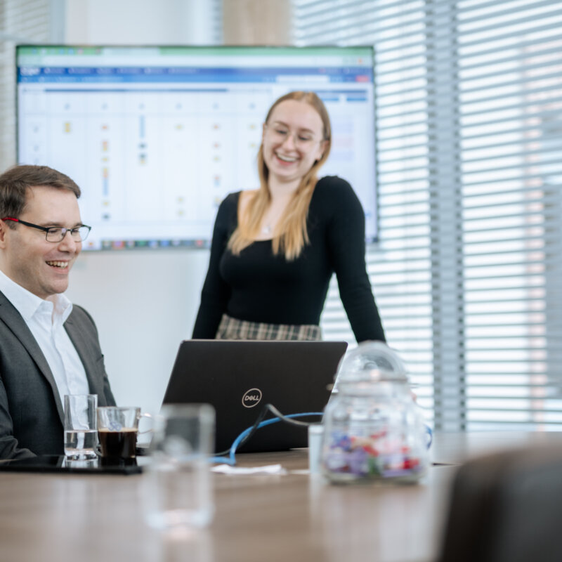 man and women in an office