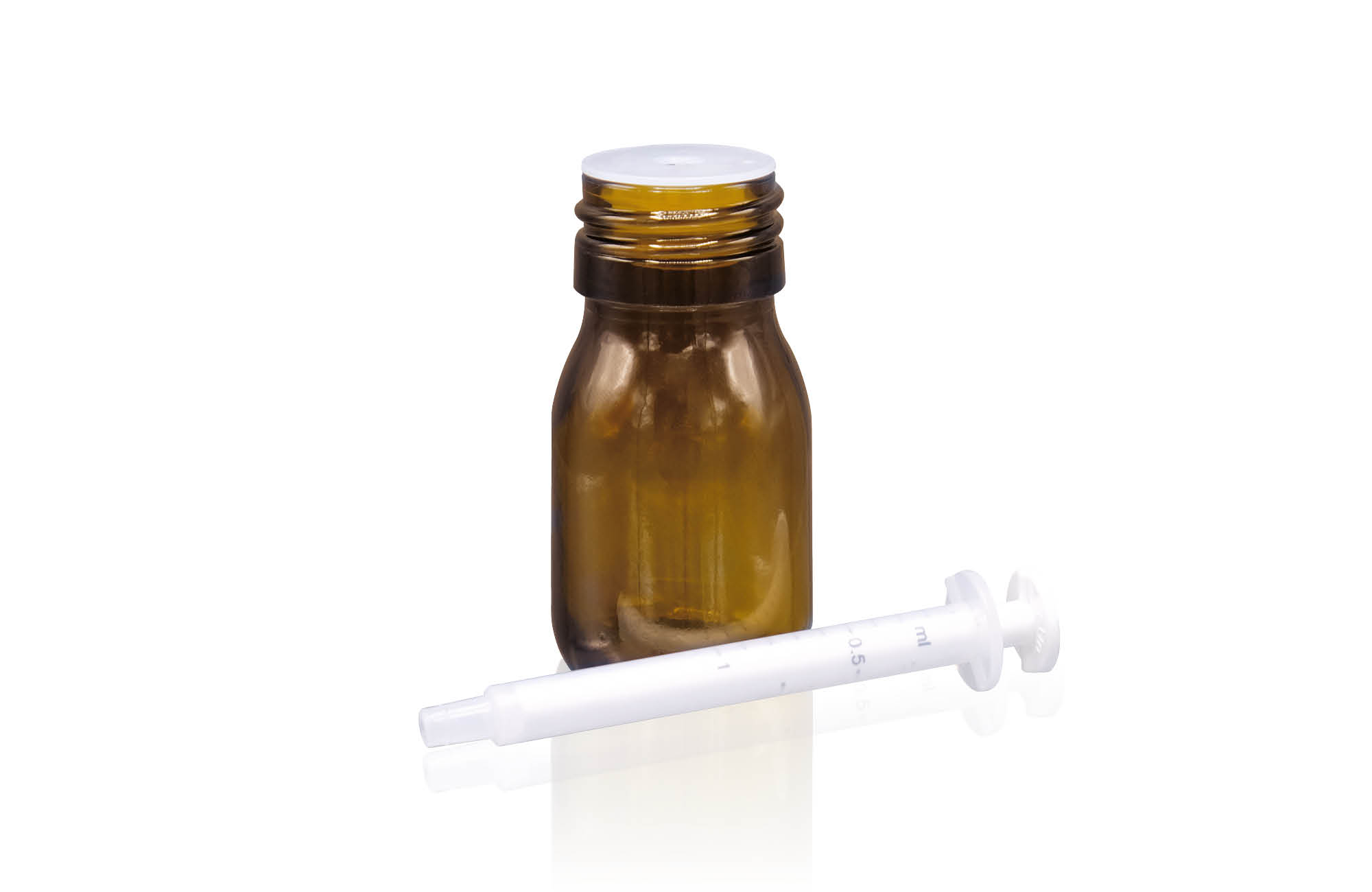 White dosing syringe with amber glass bottle