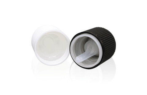 Black and white cap with dosing insert