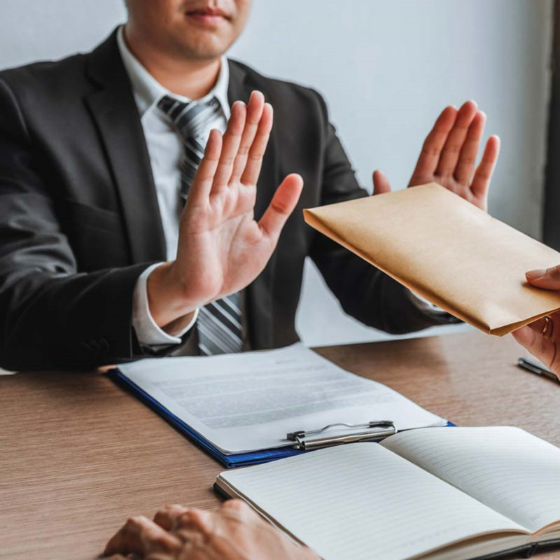 Man refusing to take envelope