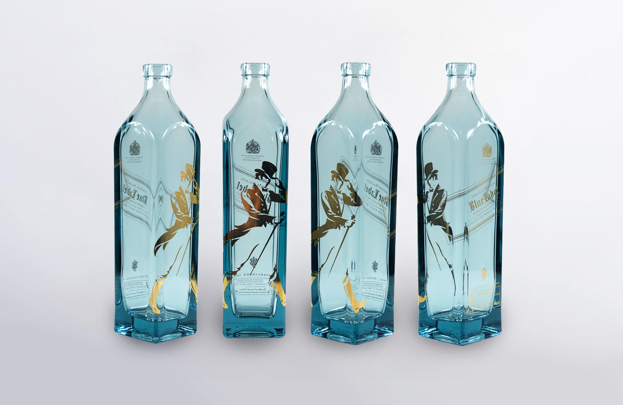 Square bottles decorated across all edges via screen printing.