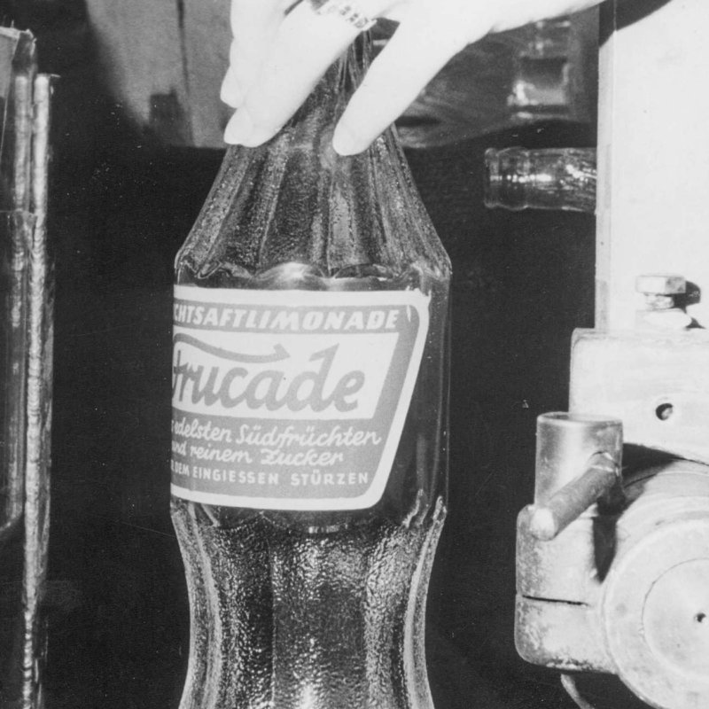 Historic picture of Frucade bottle produced and decorated in Austrian glass plant