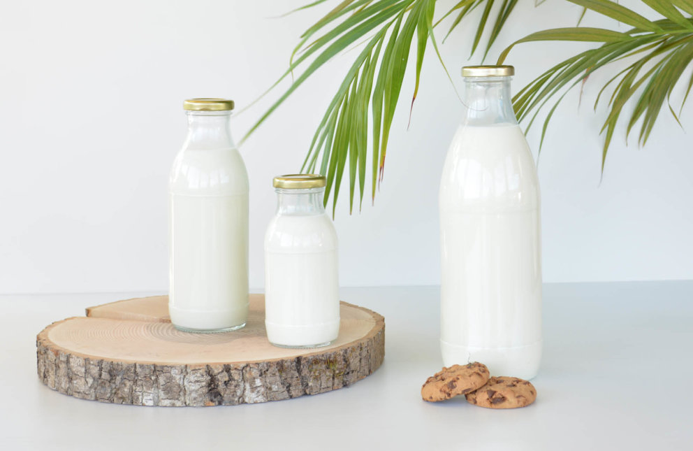 Different sizes of milk bottles manufactured by Stoelzle